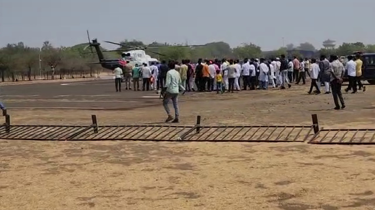 Minister Pralhad Joshi helicopter landing issue The barricade fell to the ground due to the wind vijayapura news